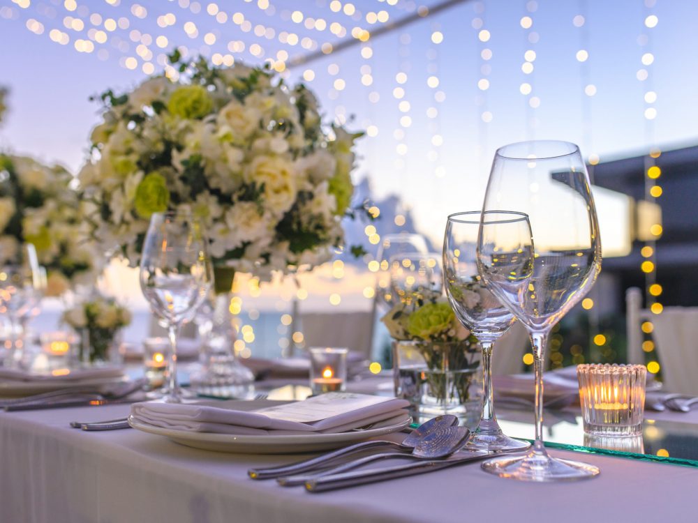 Table setting at a luxury wedding and Beautiful flowers on the table.